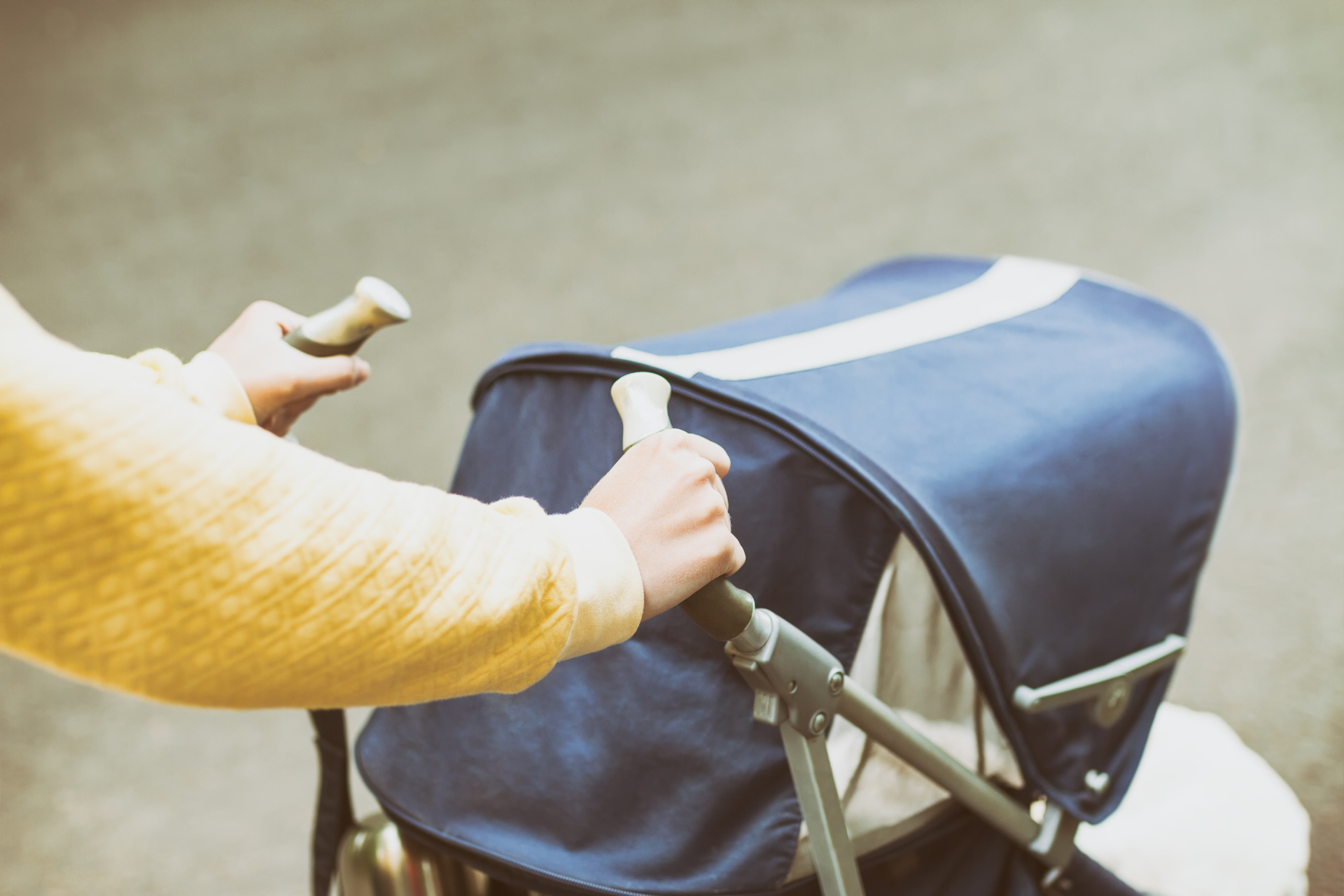Photo of a woman pushing a stroller. Are you facing depression or anxiety after having a baby? With postpartum counseling in San Francisco, CA you can begin to manage your symptoms.